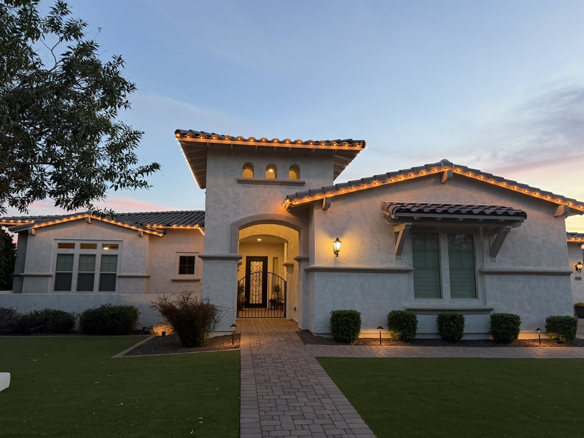 Warm white holiday roofline accents